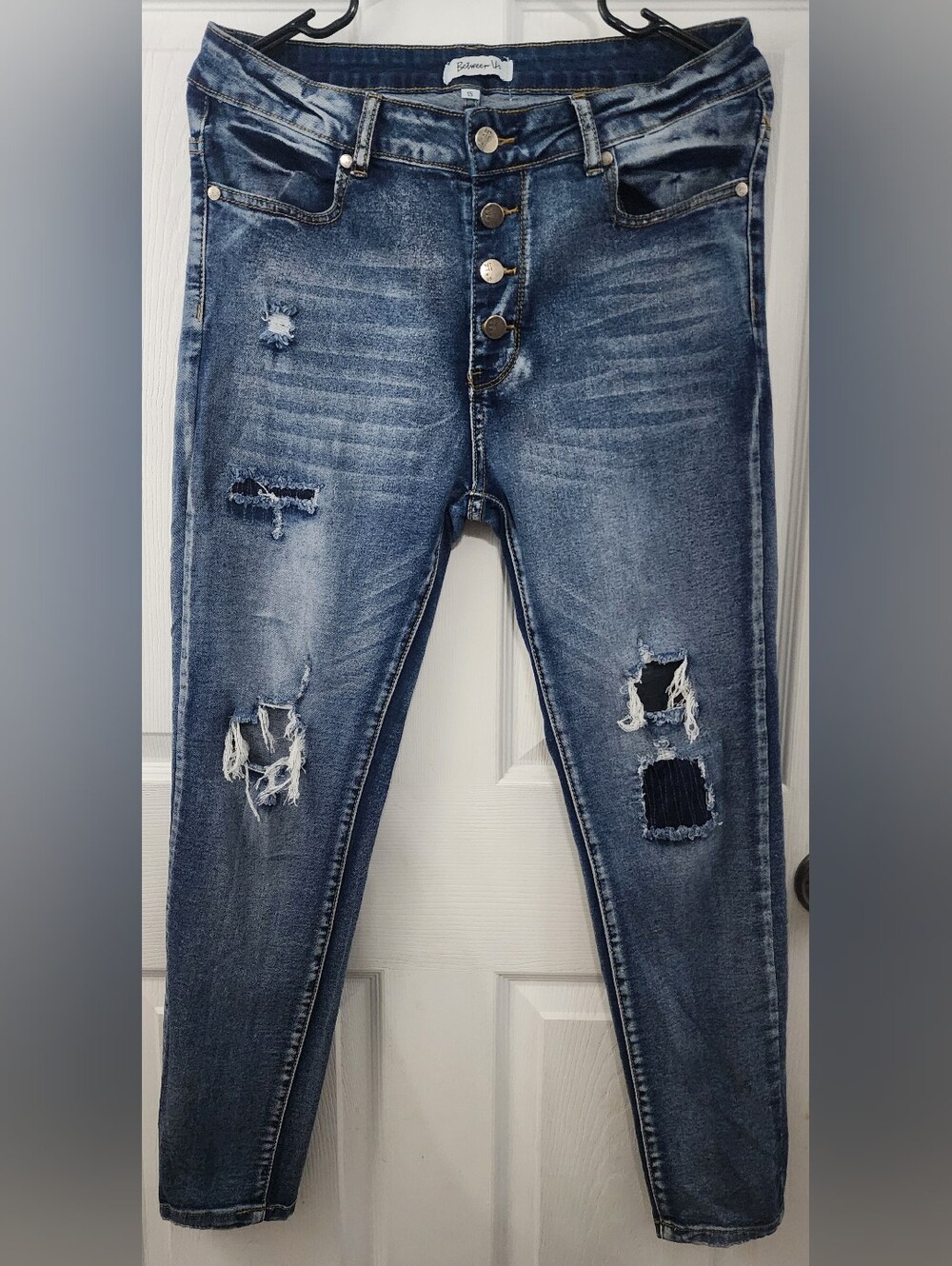 Skinny Distressed Blue Denim Jeans with Button-Fly